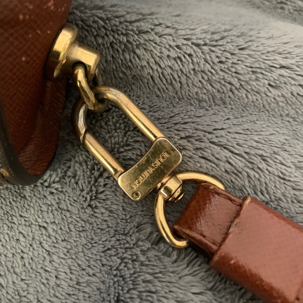 Authentic LV Orsay Clutch/Wristlet Used Good condition.